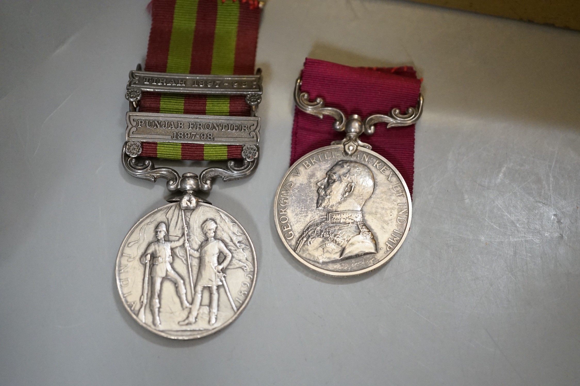 British military medals- an India 1895 medal with two clasps 24838nPte. W.J. Morris 2nd Battn. Ryl. Sussex REGT., four WWI medals and related photos, together with 20th century crowns